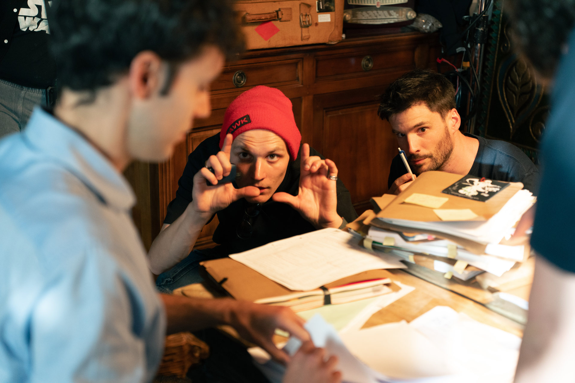 Max Decamps directing the light with the crew